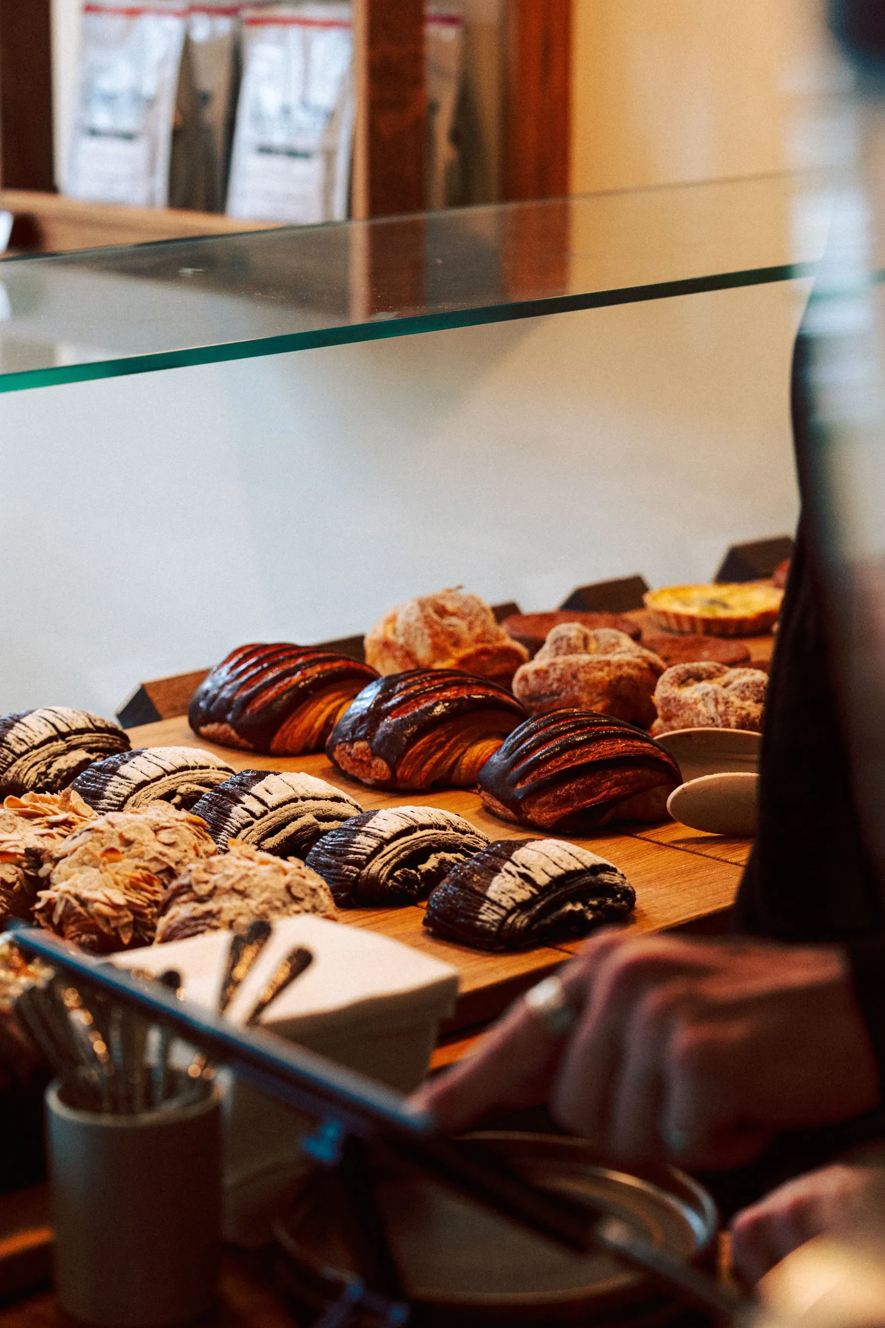 The pastry counter, being filled for the day