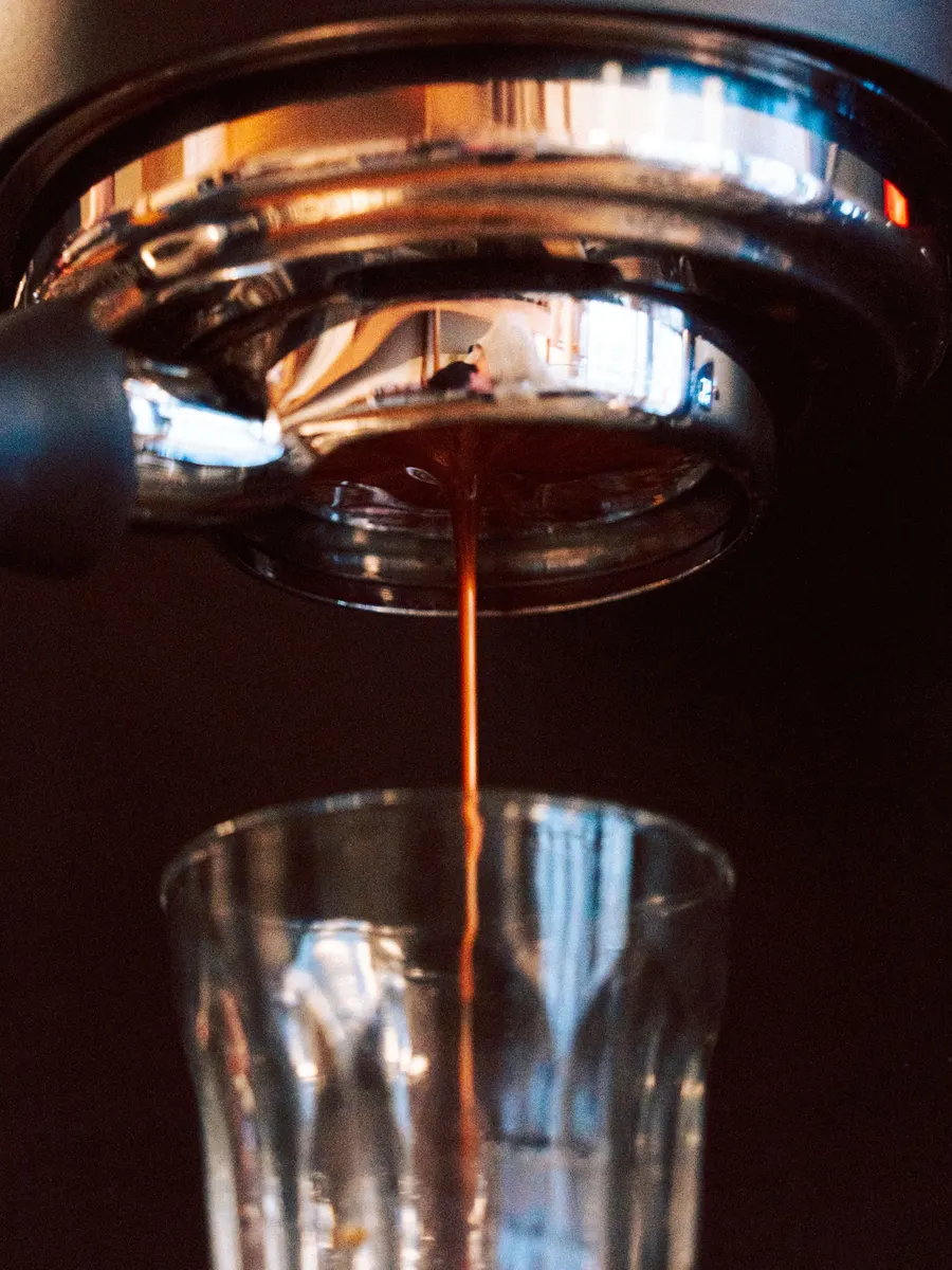Espresso pouring into a glass